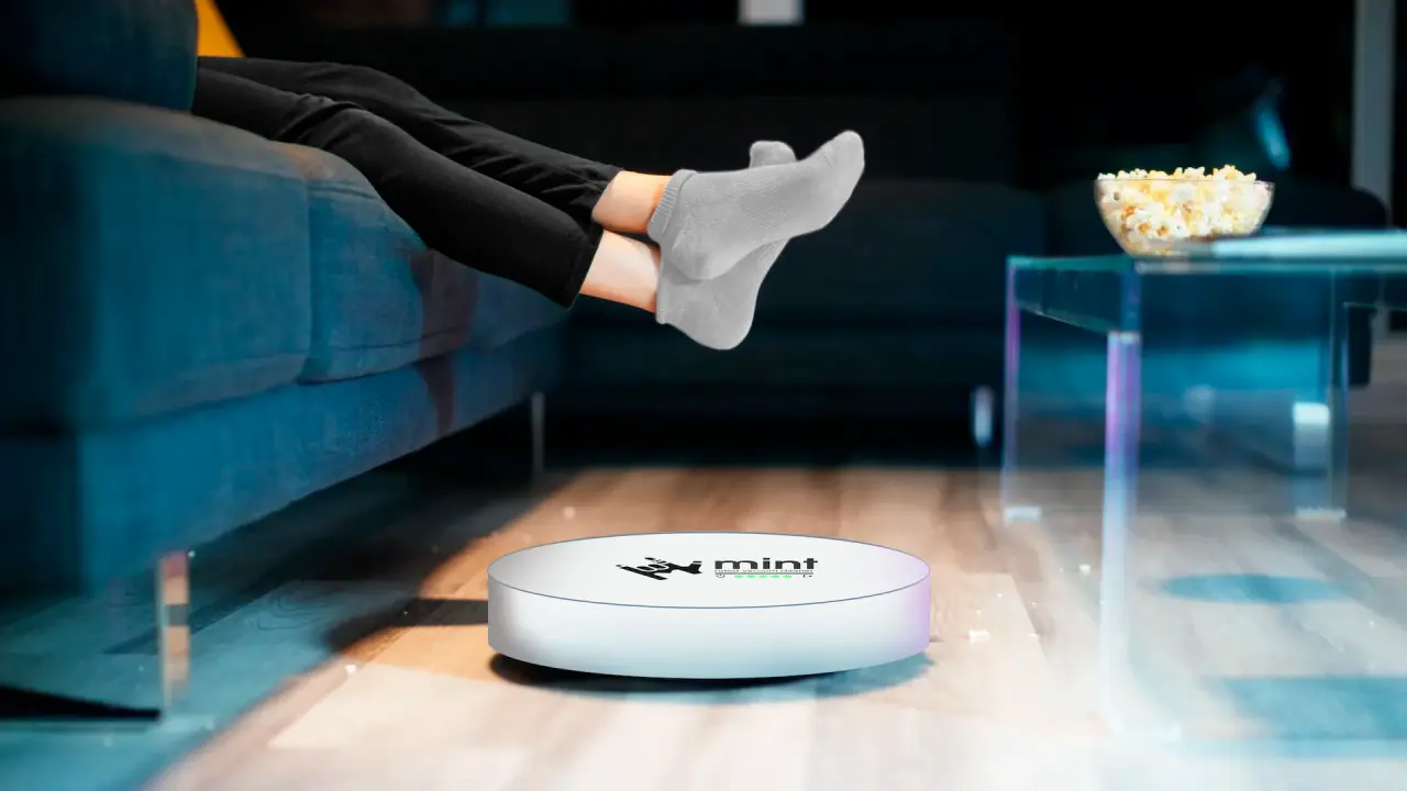 A robot vacuum cleaner with Mint logo.
