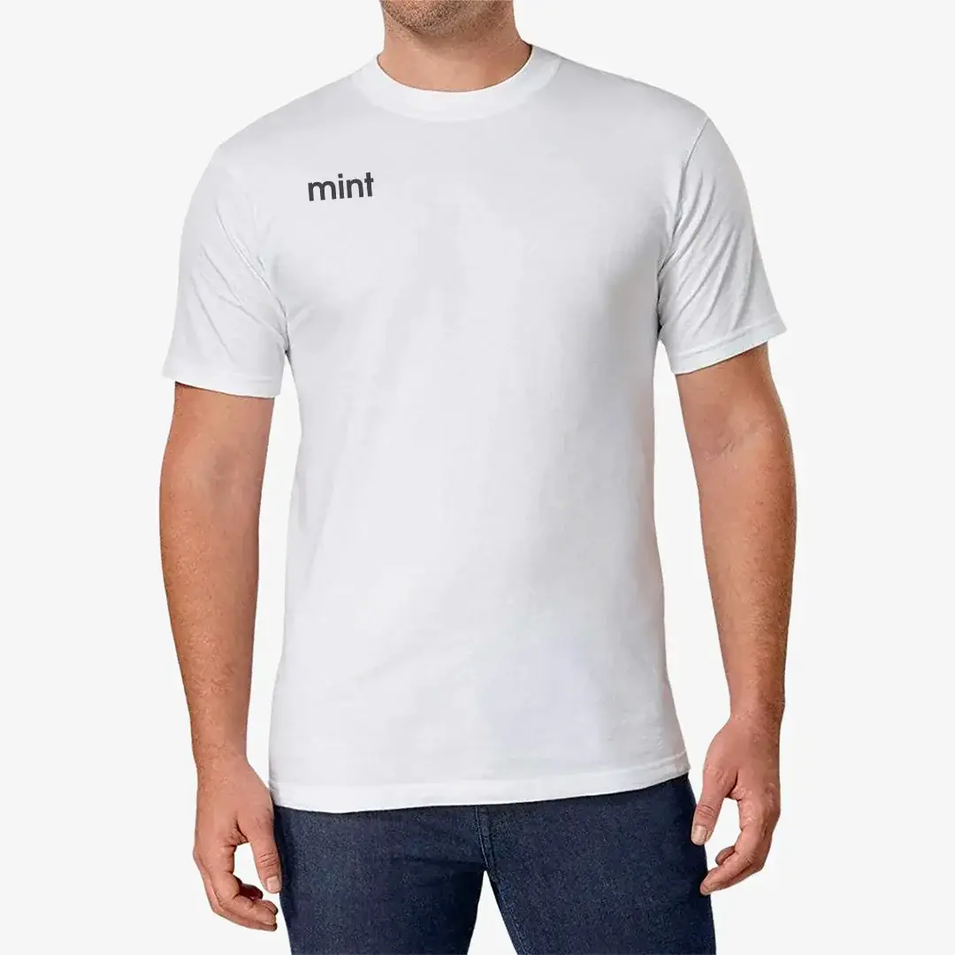 A photo of a man wearing a white shirt with Mint wordmark logo in the top corner.