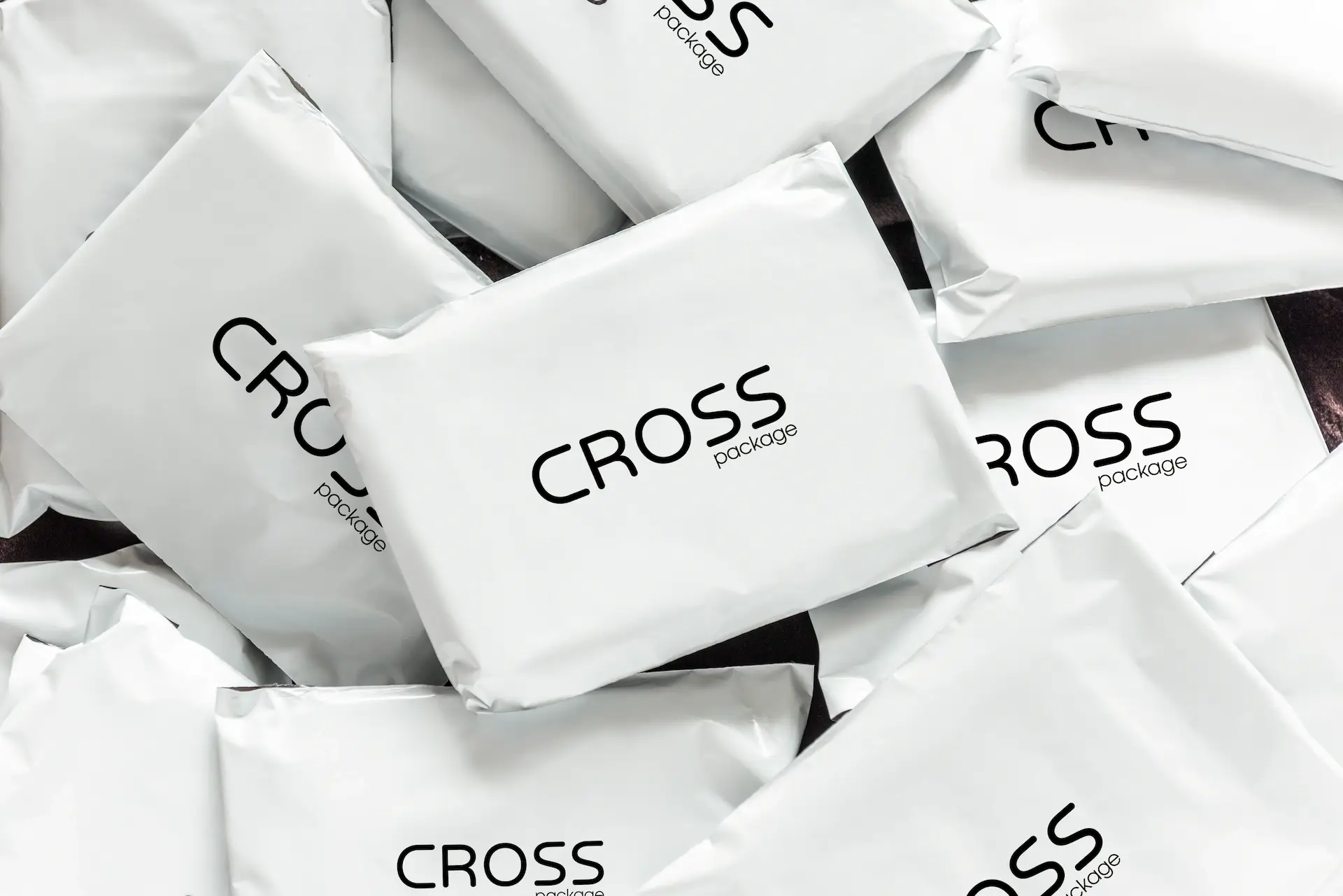 Lots of delivery packages with Cross logo.
