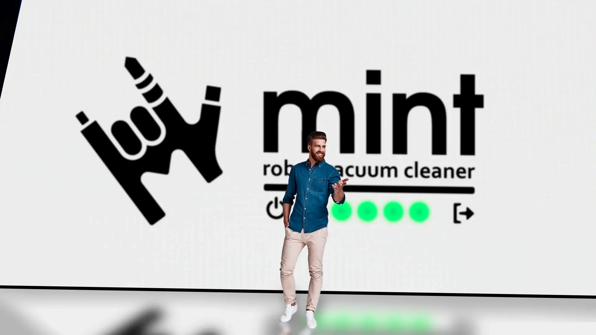 A man talking on a presentation with Mint logo on the screen.